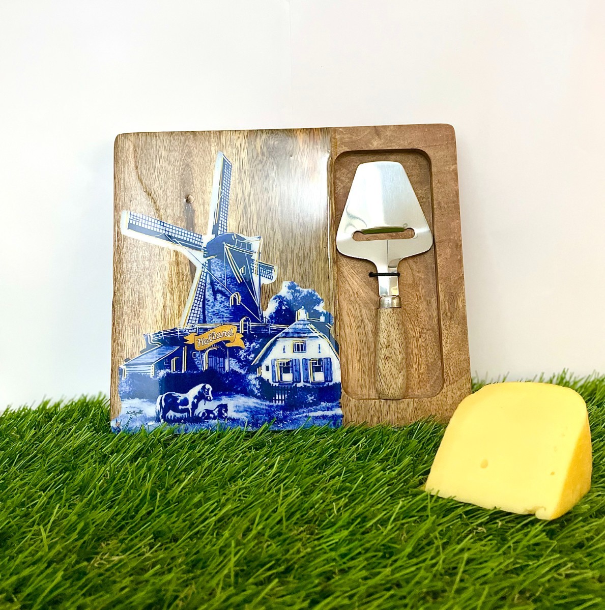 Cheese board with cheese slicer